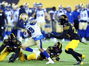 Kenny Lawler of the Winnipeg Blue Bombers runs with the ball during the 108th Grey Cup game against the Hamilton Tiger-Cats at Tim Hortons Field on Dec. 12, 2021 in Hamilton.