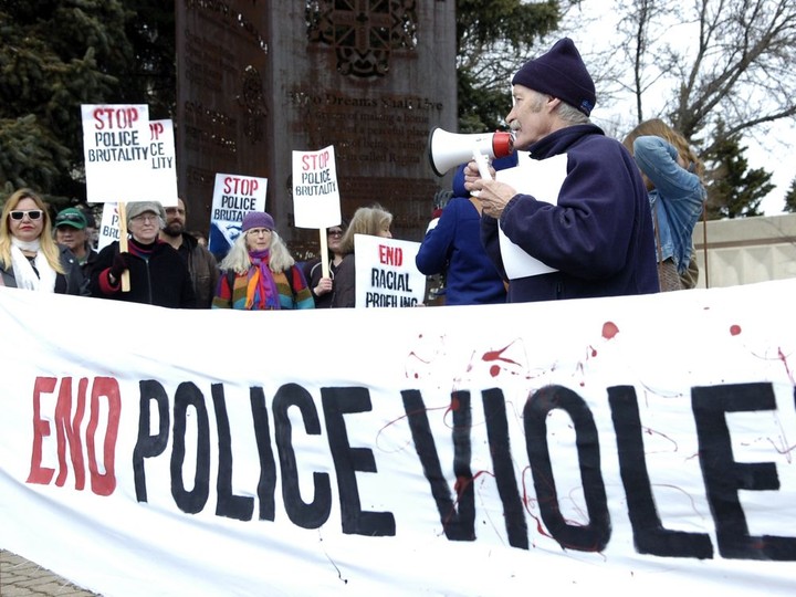  In this file photo from March 15, 2015, about 30 Regina residents gathered in front of City Hall to call for peace and protest police brutality and racial profiling here and around the world, as part of International Day Against Police Brutality. Bob Hughes (holding megaphone) is from the Saskatchewan Coalition Against Racism.