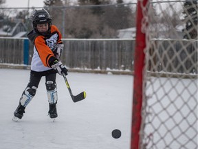 REGINA, SASK : December 27, 2018  -- Ezra Ellams fires a shot on net during a bit of hockey practice at Lakeview Park Rink on McCallum Avenue. BRANDON HARDER/ Regina Leader-Post