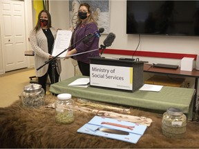 Social Services Minister and Minister Responsible for Saskatchewan Housing Corporation (SHC) Lori Carr joined representatives from All Nations Hope Network (ANHN) to officially transfer the ownership of an SHC building to ANHN, to support the Awasiw program -- a warm up station. Melanie Kingston, left community health director, accepts the transfer of ownership title from Carr.