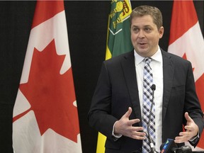 Conservative MP Andrew Scheer speaks to reporters at the Delta Hotel. Scheer says the amendment would give people in Saskatchewan a fairer deal when it comes to existing railway exemptions.