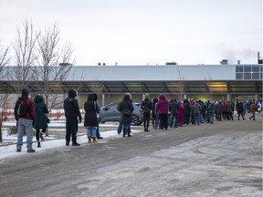 A line at the former Costco for booster doses of the COVID-19 vaccine on Dec. 20, 2021.