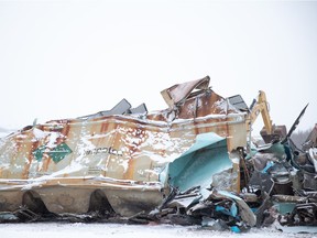 Crews work on a train that derailed over Highway 20 on Wednesday, Dec. 29, 2021 in Craven.