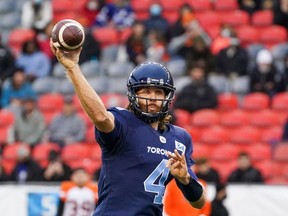 Toronto Argonauts quarterback McLeod Bethel-Thompson (4) throws a pass against the BC Lions during first half CFL action in Toronto on Saturday, Oct. 30, 2021.