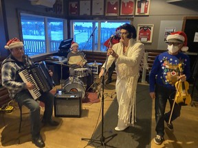 Elvis tribute artist Jamie Gass is shown during a Dec. 23 fundraiser for the Christmas Cheer Fund. Also shown are Dennis Ficor (accordion), Don Young (drums), Todd Lueck (guitar) and Brian Sklar (fiddle, vocals). The fundraiser was organized by Karl Fix on behalf of Regina's rugby community. Photo courtesy Karl Fix.
