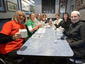 Irene Seiberling, left, and friends are shown at Nicky's Cafe on Dec. 17, 2016 during the Coffee Day fund-raiser for the Leader-Post Christmas Cheer Fund.