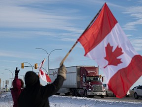 Hundreds gathered at 3850 Idylwyld Dr North in support of a convoy of truckers who passed through Saskatoon to protest vaccine mandates.