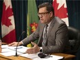 Health Minister Paul Merriman speaks in the Radio Room at the Legislative Building on Thursday, December 30, 2021 in Regina.