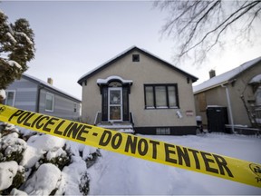 Police tape is seen on the 1600 block of Toronto Street in Regina where a body was found, prompting a death investigation.