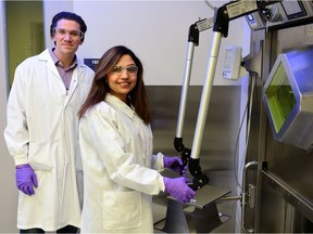 Eric Price (left), assistant professor of chemistry at the University of Saskatchewan and Canada Research Chair in radiochemistry, stands with postdoctoral fellow Elaheh Khozeimeh Sarbisheh in the Sylvia Fedoruk Canadian Centre for Nuclear Innovation at the University of Saskatchewan in 2018.