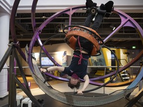 askatchewan Science Centre employee Evan Tichborne demonstrates its Gyro Gym, similar to what astronauts use to train. The centre also opened a new travelling exhibit, Beyond Human Limits Lite, on Friday and next month will host a virtual Girls in STEAM conference, where girls in Grades 6 to 9 can meet women working in science, technology, engineering, arts, and math (STEAM) fields.