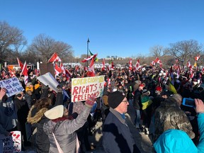 People rally in support of truckers opposed to vaccine mandates at Saskatchewan Legislative Building in Regina, on Sat. Jan. 29, 2022.