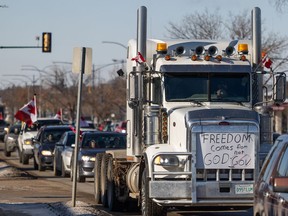 A convoy travels along 8th St. in Saskatoon, SK on Saturday, February 12, 2022.