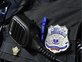Stock Photo, Regina police service member badge and radio for graphic in Regina on June 30, 2016.