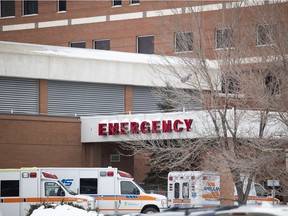 Ambulances are parked outside Regina General Hospital on Thursday, January 27, 2022.
