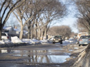 Cracks in the road are shown Garnet street on Thursday, February 10, 2022 in Regina.
