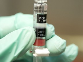 This file photo taken on August 27, 2013 shows a nurse loading a syringe with a vaccine against Hepatitis A.