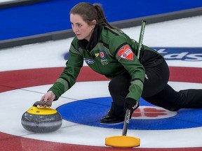 Saskatchewan skip Penny Barker delivers a rock as they play Nunavut at the Scotties Tournament of Hearts at Fort William Gardens in Thunder Bay, Ont. on Wednesday.