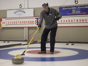 Ossie Lakness, 98, still plays twice a week at the Callie Curling Club  against another men's teams.