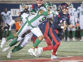 Defensive end Pete Robertson, shown sacking Montreal Alouetttes' Matthew Shiltz on Oct. 30, has signed a new contract with the CFL team.