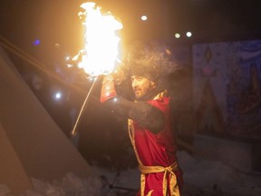 Daniel Tamagi manipulates fire during his performance at the  FROST Regina winter festival in Confederation Park on Feb. 9, 2022.