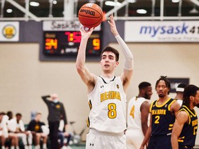 Ben Hillis attempts a shot with the University of Regina Cougars men's basketball team. Hillis is in his final season of eligibility with the Cougars. Credit: Arthur Ward/Arthur Images