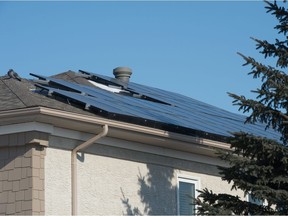 An array of solar panels can be seen on top of the Regina & Region Home Builders' Association building on McKay street in Regina, Saskatchewan on Feb. 18, 2021.