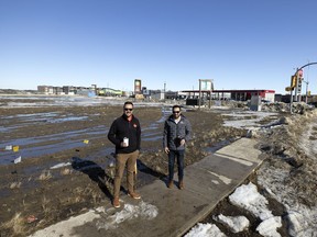 Brothers and business partners Jon Di Stasi, left, and Mike, of Di Stasi Real Estate, stand near the corner of Chuka Blvd and Greenfalls Drive on Thursday, March 17, 2022 in Regina. They have plans for a sustainable Tim Hortons restaurant in The Greens on Gardiner.