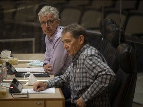Tom Atkins (L) and Jerry Boulanger (R) speak at the city's new Energy and Sustainability Framework inside Henry Baker Hall on Thursday, March 24, 2022 in Regina.