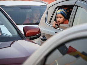 A Ukrainian child looks out of a car at the Romanian-Ukrainian border Isaccea-Orlivka on March 24.