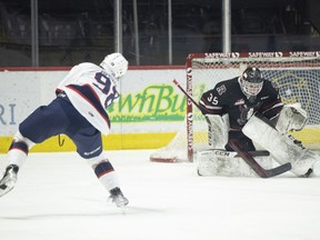 Regina Pats centre Connor Bedard, left, shown facing Red Deer Rebels goalie Connor Ungar on March 4 at the Brandt Centre, is to return to action Friday against the visiting Lethbridge Hurricanes.