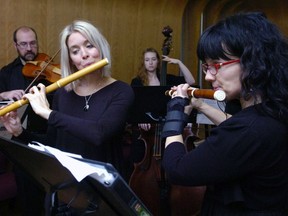 Marie-Noelle Berthelet (center left), Tara Semple (far right) and other members of Per Sonatori rehearse for a Christmas concert in 2014.