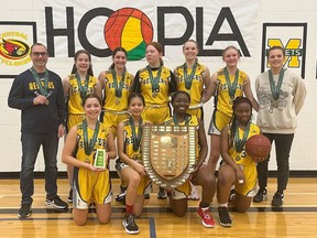The Harvest City Reapers are shown Saturday after winning the Saskatchewan High Schools Athletic Association's 4A girls championship at Hoopla in Melfort.
