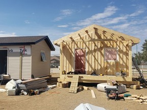 A National Housing Council report said recommending spending by Ottawa could also buy the government two years to craft a longer-term strategy to house urban Indigenous families and close a wide affordability gap for that part of the population.