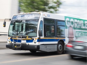 A public transit bus travels along 11th Avenue in Regina, Saskatchewan on June 10, 2020.