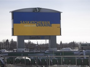 A message displaying "Saskatchewan stands with Ukraine" is written on the end zone screen at Mosaic Stadium on Wednesday, March 2, 2022 in Regina.