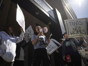 A group calling themselves "advocates, allies and those needing housing" walked to Social Services offices in Regina on Monday, April 4 to press upon Social Services Minister Lori Carr the shortcomings in the Saskatchewan Income Support (SIS) program, and the needs of those who are houseless on Monday, April 4, 2022 in Regina.