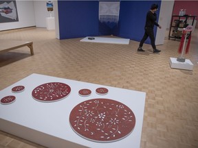 A piece by Maria Hupfield in Radical Stitch featuring 48 artists and around 100 works from across Turtle Island.