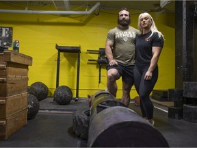 Couple Isaac Maze and Melissa Peacock, who recently travelled to Hilton Head, South Carolina for the Strengthlete Collective Clash, stand for a portrait at Mettle Performance Training Centre on Friday, April 29, 2022 in Regina.