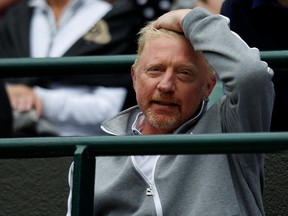 Boris Becker shown in a 2016 file photo at Wimbledon, centre court, when he was coach of Serbia's Novak Djokovic