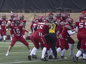 Regina Riot quarterback Shanelle Rioux passes the ball during Saturday's 68-0 victory over the Winnipeg Wolfpack at Leibel Field.