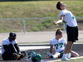 The Saskatchewan Roughriders, shown earlier this month at rookie camp, will be stretching it out at their main training camp now that the strike has ended.