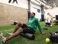 Saskatchewan Roughrider Godfrey Onyeka (left) trains at Ignite Athletics, since the official training camp is still on hold as they wait for a fair deal. Photo taken in Saskatoon, Sask. on Tuesday May 17, 2022.