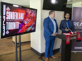 Tim Reid, left, president and CEO of REAL, and TJ Singh, executive director of Futbol Club Regina, announce a friendly soccer match between U23 teams from Sunderland Association Football Club and the Toronto Football Club to be played on August 3, 2022 at Mosaic Stadium.  The announcement was made on Wednesday, May 25, 2022 in Regina.