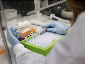 A research technician prepares samples of wastewater at the University of Saskatchewan's wastewater testing facility which will then be analyzed to glean insight into how COVID-19 might be spreading in Saskatoon and other areas in Saskatchewan. Photo taken in Saskatoon on Thursday, Sept. 30, 2021.