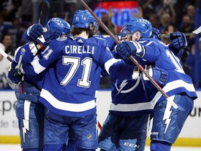 Lightning right wing Nikita Kucherov (86) is congratulated after scoring a goal against the Maple Leafs during the third period of Game 6 of the first round of the 2022 Stanley Cup Playoffs at Amalie Arena in Tampa, Fla., Thursday, May 12, 2022.