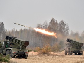 Ukrainian 122 mm MLRS BM-21 Grad fires rocket during a military exercise at a shooting range close to Devichiki in the Kiev region on October 28, 2016.