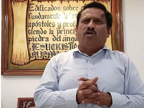 Pastor Rene Huezo in the church's YouTube videos.