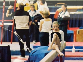 In this 2002 image courtesy of Amelia Cline, gymnast Amelia Cline during the 2002 Nationals in Winnipeg, Canada.