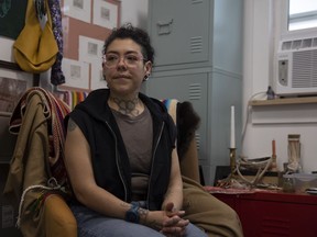 Indigenous artist and tattooer Stacey Fayant sits inside her studio on May 18, 2022 in Regina.